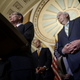 U.S. Senate Minority Leader Mitch McConnell (R-KY) (R) looks on as Sen. John Barrasso (R-WY) speaks to reporters following the weekly Republican policy luncheons, on May 03, 2022, in Washington, DC.